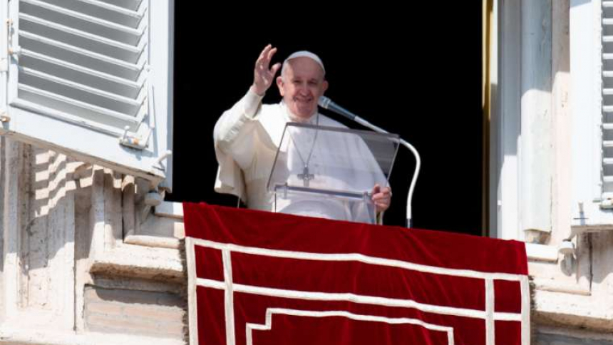 Pope Francis greets pilgrims during his Angelus address Feb. 21, 2021