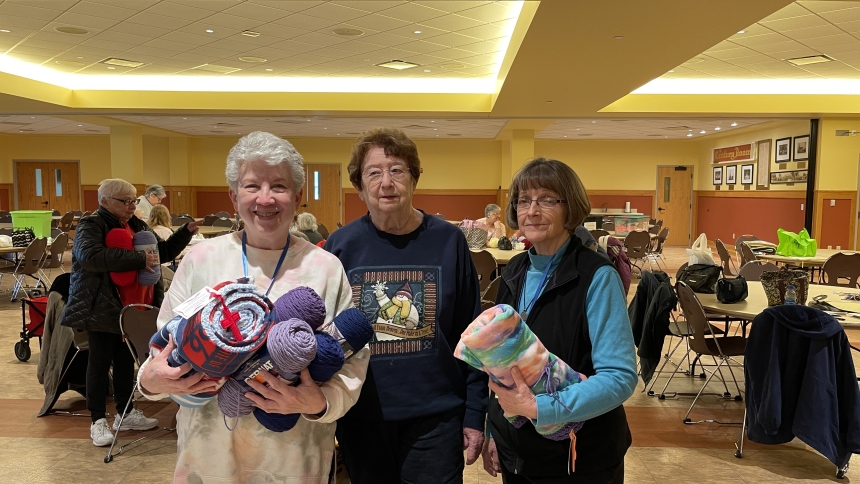Eve Duray, Sharon Przybylinski and Labors of Love Co-ordinator Betty Eaton gather supplies during a meeting of the Labors of Love ministry at St. Michael the Archangel in Schererville. (Provided photo)
